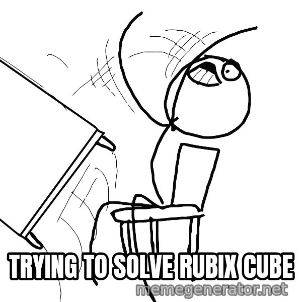 Desk Flip Rage Guy meme: trying to solve rubix cube